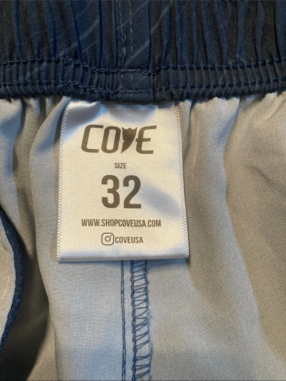 Cove Blue Swim Trunks with White Drawstring